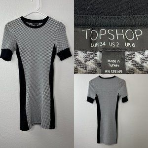Top Shop Body Con Dress Black sides with gray and white center. Short sleeved